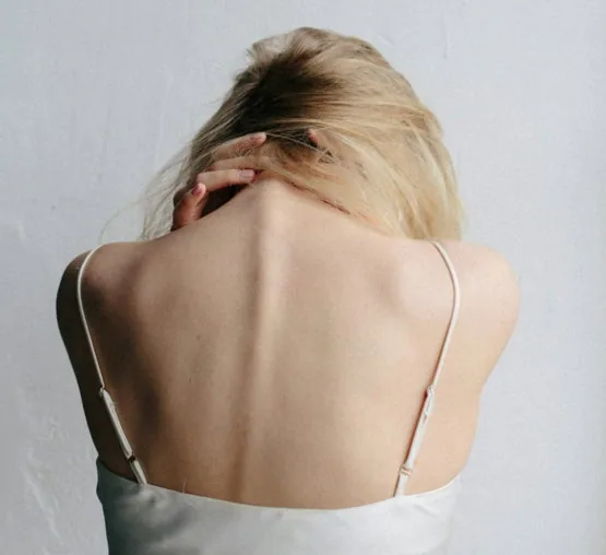 woman in white tank top